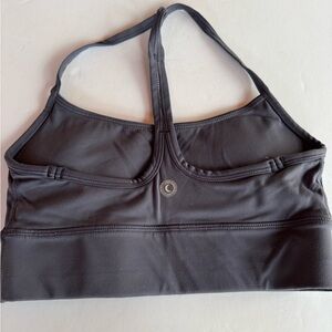 DYM women’s sports bra size 2 with build in padding. Grey/navy color.